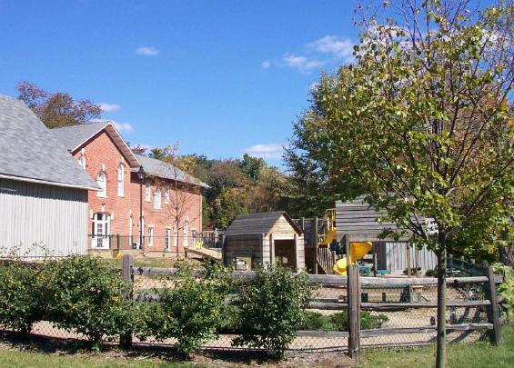 Photo of a playset at the Child Development Center, locat the The Ridges