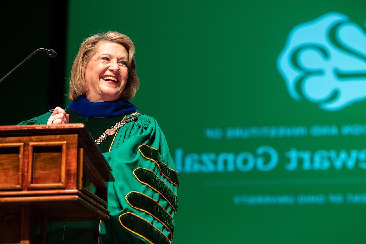 Dr. Lori Gonzalez smiling at her Investiture ceremony